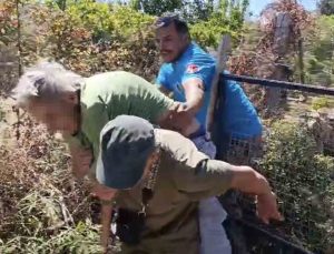 Kendini yakmak isteyen yaşlı kadın makilik alanı ateşe verdi